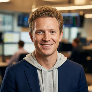 Foto de perfil de Ryan Brooks, presentado como analista principal de trading en Vasto Patermanza